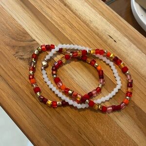 Red and gold bracelet stack ❤️